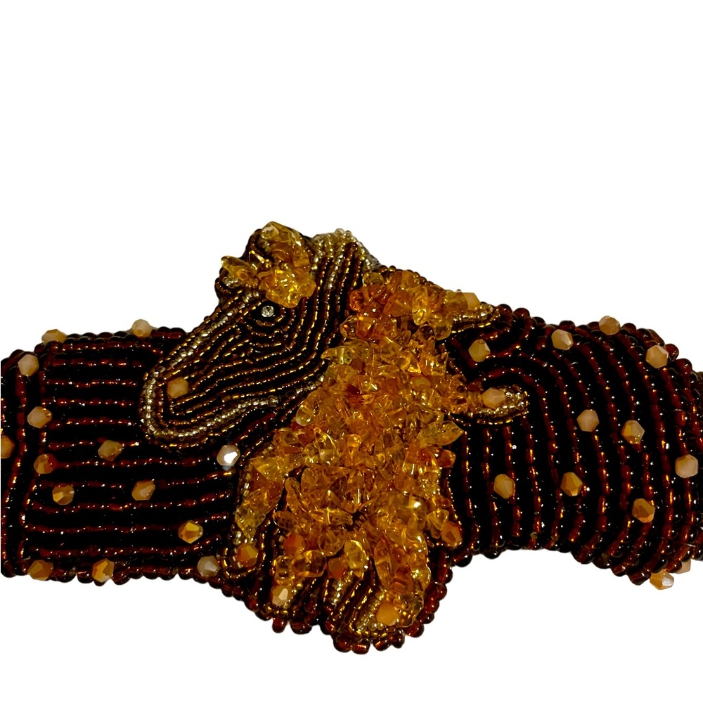 Hand-crafted beaded cuff bracelet.Amber